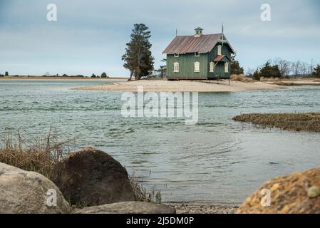 Eine alte Fischerhütte am Strand. Stony Brook Stockfoto