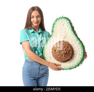 Junge Frau mit mexikanischer Pinata auf weißem Hintergrund Stockfoto