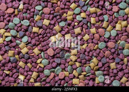 Katze getrocknete Nahrung Hintergrund und Textur, Draufsicht, Nahaufnahme Stockfoto