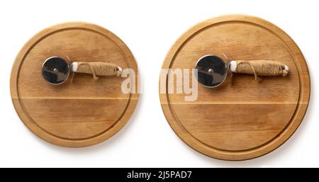 Runde hölzerne Pizzaplatte und rundes Messer isoliert auf weiß Stockfoto