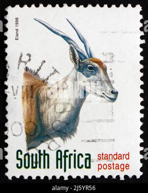 SÜDAFRIKA - UM 1998: Eine in Südafrika gedruckte Briefmarke zeigt Eland, Taurotragus Oryx, Antelope, um 1998 Stockfoto