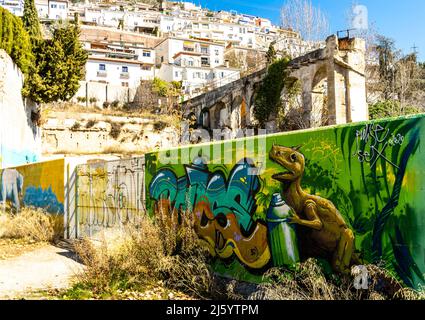 Wandbild mit Dinosaurier und Farbdose an der Wand im Parque de las Palmas, Granada, Spanien, Europa Stockfoto