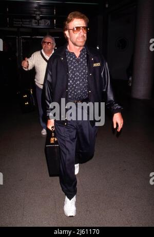 Chuck Norris um die 1980er Jahre. Quelle: Ralph Dominguez/MediaPunch Stockfoto
