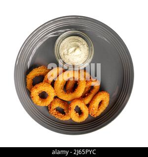 Isolierte Platte mit frittierten Zwiebelringen Stockfoto