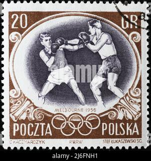 Boxer in Aktion auf vintage polnisch Porto stam Stockfoto