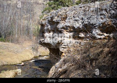 Spring Rock Formation from Minerals - Stream Rock Carved Stockfoto