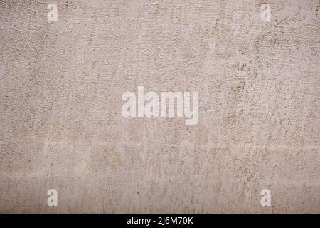 Alte Wandstruktur mit rissiger Vintage-Farbe. Abstrakter Grunge-Hintergrund Stockfoto
