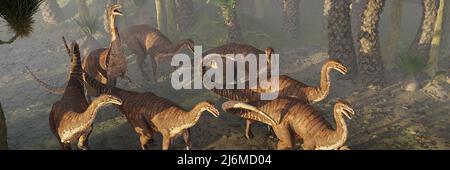 Plateosaurus-Herde, Dinosaurier aus der späten Trias, die in einem Baumfarnwald spazieren Stockfoto