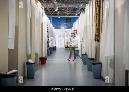 Alltag nach der Flucht aus der Ukraine im Flüchtlingslager Moldexpo Exhibition Centre, Chisinau, Moldawien. Stockfoto