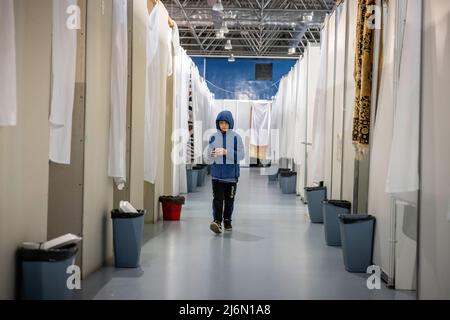 Alltag nach der Flucht aus der Ukraine im Flüchtlingslager Moldexpo Exhibition Centre, Chisinau, Moldawien. Stockfoto