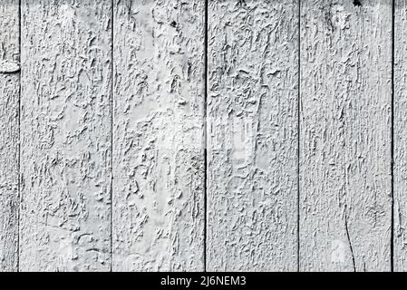 Hintergrund von Boards. Textur von rissiger und abblätternder Farbe auf einer Holzoberfläche Stockfoto