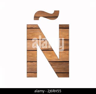 Alphabet Letter Ñ - Feder und Groove Board Stockfoto