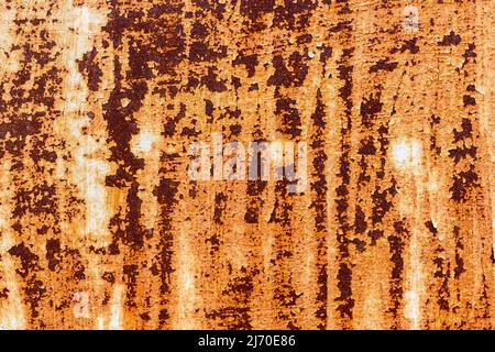 Rostige Metalloberfläche. Geschälte Farbstruktur. Rost an Metalltüren. Stockfoto