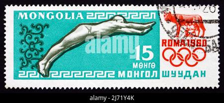 MONGOLEI - UM 1960: Eine in der Mongolei gedruckte Marke zeigt Tauchen, Olympische Spiele 17., Rom, um 1960 Stockfoto