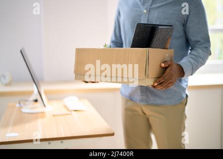 Von Der Stelle Zurücktreten Oder Mitarbeiter Entlassen, Der Aus Dem Amt Auszieht Stockfoto