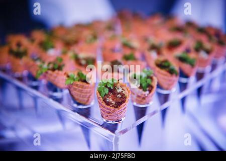 Party Hors d'oeuvres serviert in Eiszapfen Stockfoto