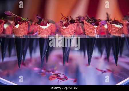 Party Hors d'oeuvres serviert in Eiszapfen Stockfoto