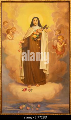 MONOPOLI, ITALIEN - 6. MÄRZ 2022: Das Gemälde der heiligen Therese von Avila in der Kirche Chiesa di San Franceso d Assisi von A. Nicolas (1931). Stockfoto