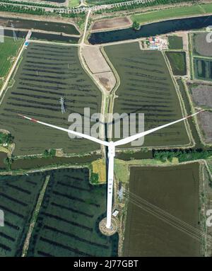 HUAI'AN, CHINA - 6. MAI 2022 - Windkraft am Werk ist in Huai 'an, der ostchinesischen Provinz Jiangsu, am 6. Mai 2022 zu sehen. Stockfoto