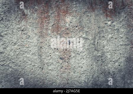 Zementwandoberfläche, abstrakter dunkelgrauer Hintergrund. Betongrunge Wandstruktur. Loft-Stil Stockfoto