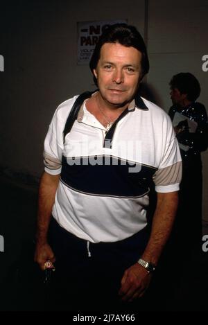 **DATEI FOTO** Mickey Gilley ist verstorben. Mickey Gilley April 1990 Quelle: Ralph Dominguez/MediaPunch Stockfoto