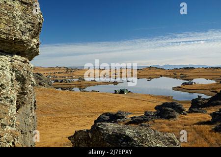 Fischerhütten und Poolburn Dam, Central Otago, Südinsel, Neuseeland Stockfoto