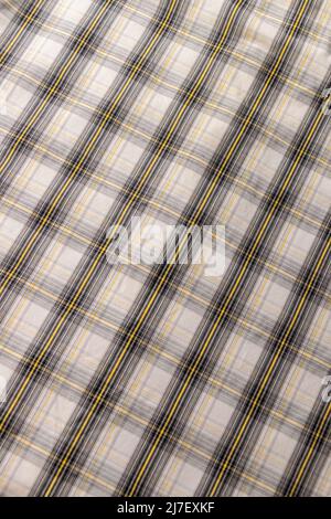 Klassische geometrische Tweed-Qualität in grau und gelb Stockfoto