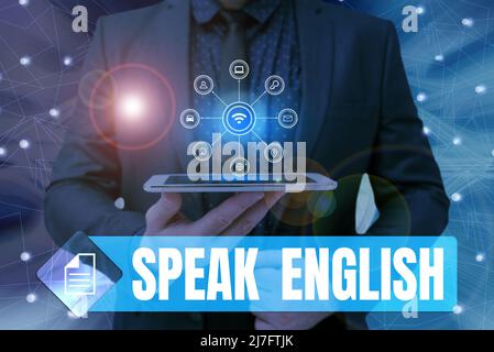 Handschriftentext sprechen Englisch. Konzeptfoto Studie eine andere Fremdsprache Online-verbale Kurse Mann hält Bildschirm des Mobiltelefons zeigt die Stockfoto