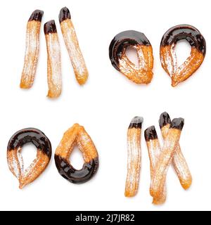 Set von leckeren Churros in Schokolade auf weißem Hintergrund getaucht Stockfoto