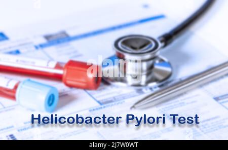 Helicobacter Pylori Test Testing Medical Concept. Checkup Liste medizinischer Tests mit Text und Stethoskop Stockfoto