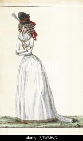 Modische Frau oder Religieuse neu in der Gesellschaft, in Leinen Kleid a la Vestale mit Galon d'Or, Gaze fichu, Frisur mit fünf Reihen von Locken a la Passion, Chignon, schwarzen Gaze Pouf Haube mit Aigrette und Knoten von nakara Bänder verziert. Handkolorierter Kupferstich von Jean-Antoine le Brun oder Lebrun-Tossas Journal de la Mode et du Gout, früher Cabinet des Modes, chez Buisson, Paris, und Joseph le Boffe, London, 4me Cahier, 25. März 1790. Stockfoto