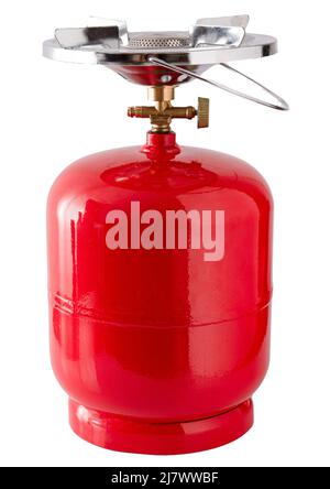 Tragbare Gasflasche. Eine kleine kompakte Reiseflasche mit einem Brenner zum Kochen auf einer Wanderung. Der Gasofen der Straße ist mit Propan gefüllt. Roter Tank. Stockfoto