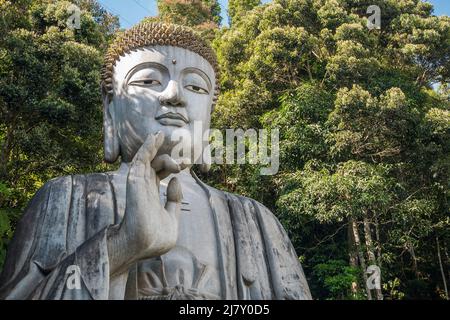 Stone buddha, der sich am Chin Swee Caves Temple, Genting Highlands, befindet. Stockfoto