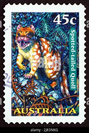 AUSTRALIEN - UM 1997: Eine in Australien gedruckte Marke zeigt Spotted-tailed Quoll, Tiger Quoll, Dasyurus maculatus, Beuteltier, um 1997 Stockfoto