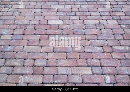 Betonpflasterung. Schönes Muster, Hintergrund Nahaufnahme. Stockfoto