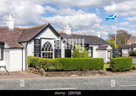 Der weltberühmte Old Blacksmiths Shop, Heimat der Amboss-Hochzeit, in Gretna Green, Dumfries & Galloway, Schottland, Großbritannien Stockfoto