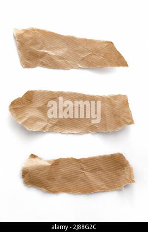 Recyceltes Papier Bastelstab auf weißem Hintergrund. Stockfoto