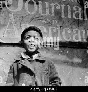 New York, New York. Harlem-Zeitungsjunge. Stockfoto