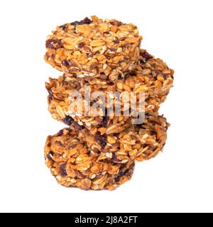 Turm von Cookies mit Honig Haferflocken Getreide auf dem weißen isoliert Stockfoto
