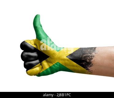 Hand machen Daumen nach oben gemalt mit Flagge von jamaika Stockfoto