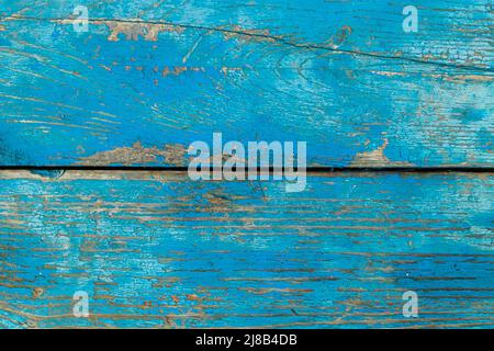 Alte Bretter mit blauer Farbe bedeckt. Textur Hintergrund von Holz. Schäbige Holzoberfläche. Stockfoto