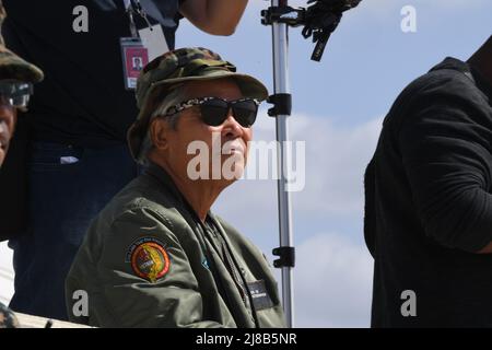 Nick Ut, der mit dem Pulitzer-Preis ausgezeichnete Fotograf bei der Arbeit. Stockfoto