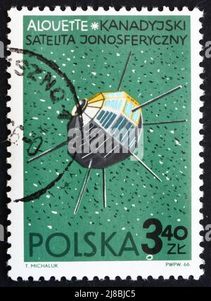 POLEN - UM 1966: Eine in Polen gedruckte Briefmarke zeigt Alouette, Canadian Satellite, um 1966 Stockfoto