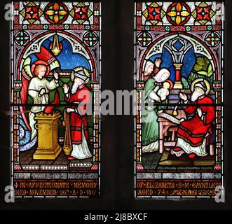 Ein Buntglasfenster von Frederick Preedy, das die Verkündigung an Zacharias und die Geburt seines Sohnes, der Fladbury Church, Worcestershire, darstellt Stockfoto