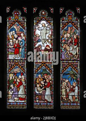 Ein Buntglasfenster von Frederick Preedy mit Szenen aus dem Leben Christi und der Verklärung, Fladbury Church, Worcestershire Stockfoto