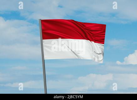 Indonesische Nationalflagge winkt im Wind. Abbildung Himmel Hintergrund 3D Stockfoto