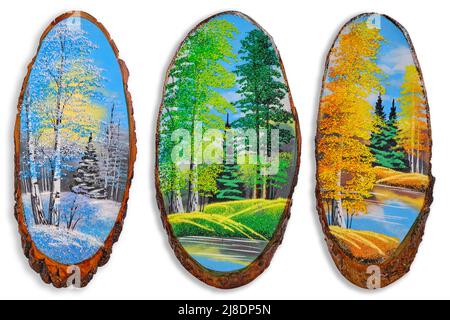 Drei Gemälde mit drei Jahreszeiten, Winter, Sommer und Herbst, weißer Hintergrund Stockfoto