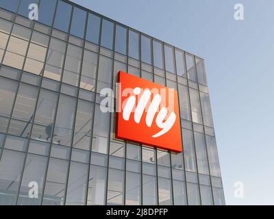 Triest, Italien. 2.Mai 2022. Nur zur redaktionellen Verwendung, 3D CGI. Illy Corporation Logo auf Glasgebäude. Büro Der Coffee Company Am Arbeitsplatz Stockfoto