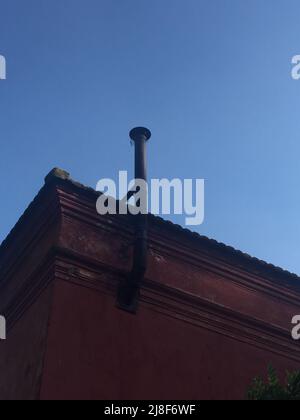 Kamin eines alten Gebäudes Stockfoto