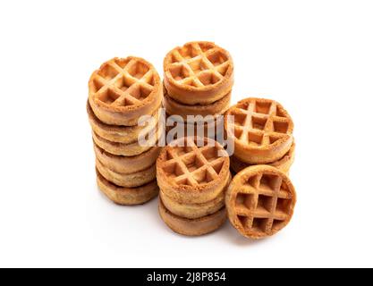 Stapel leckerer runder Mini-Waffeln, isoliert auf Weiß Stockfoto